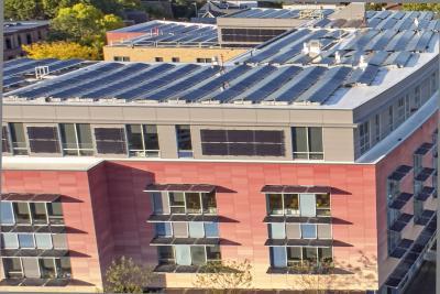 Aerial view of King Open School with solar panels on the roof
